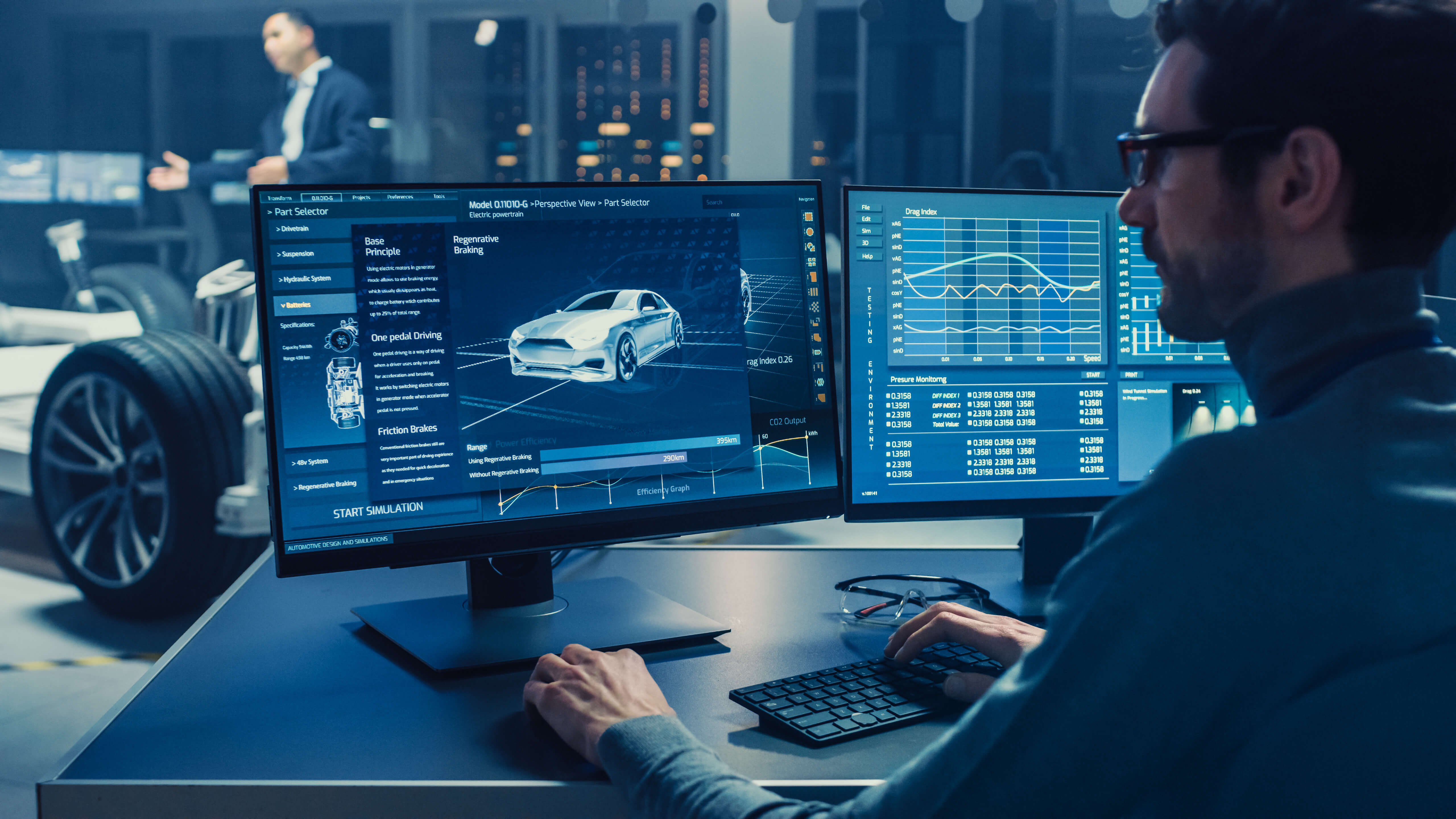 person working at computer with UI interface of vehicle information