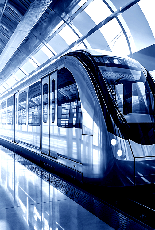 A sleek, modern rail-based commuter train sitting in a passenger station.